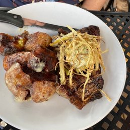 Grilled Ribeye with compound butter and smashed potatoes.  This was an evening special feature.