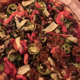 Built my own pizza, tried the vegan chorizo on part (right/bottom)
