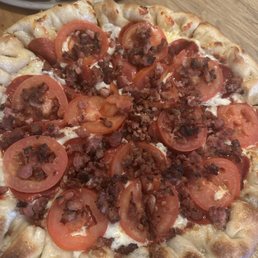 Pepperoni, tomatoe, and bacon pizza Pepperoni, tomatoe, and bacon pizza