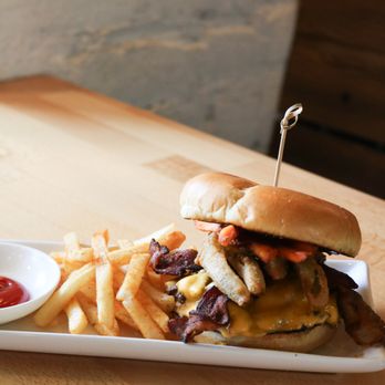 F The Bar - Southern Charmer - Double Patty, American Cheese, Bacon, Fried Pickles, Sweet Potato Fries and Spicy BBQ sauce - Cocktail Bars Near Me - Las Vegas, Nevada F The Bar - Southern Charmer - Double Patty, American Cheese, Bacon, Fried Pickles, Sweet Potato Fries and Spicy BBQ sauce - Cocktail Bars Near Me - Las Vegas, Nevada