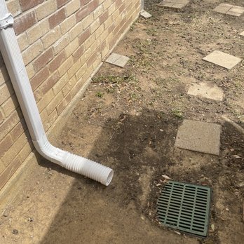 DFW Gutter Guru - Reroute downspout from the back to the side of the house - Gutter Services Near Me DFW Gutter Guru - Reroute downspout from the back to the side of the house - Gutter Services Near Me