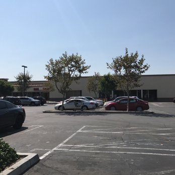 Anaheim Liquor - a parking lot with several parked cars - Convenience Stores Near Me - Anaheim, California Anaheim Liquor - a parking lot with several parked cars - Convenience Stores Near Me - Anaheim, California