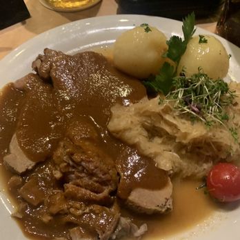 Paulaner - pork with gravy and potatoe dumplings - Bavarian Near Me - Frankfurt, HE Paulaner - pork with gravy and potatoe dumplings - Bavarian Near Me - Frankfurt, HE