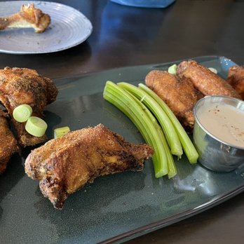 Southern Social - Dry rub wings. Started eating before taking the picture. Came with 8 wings and were very tasty! Definitely will come back for wings! - Southern Near Me - Eagan, Minnesota