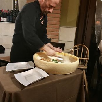Nerino Dieci - Most delicious spaghetti prepared in cheese wheel with cherry tomatoes and basil. The best! - Mediterranean Near Me - Milan, Michigan Nerino Dieci - Most delicious spaghetti prepared in cheese wheel with cherry tomatoes and basil. The best! - Mediterranean Near Me - Milan, Michigan