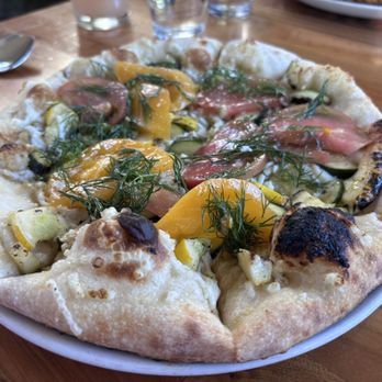 Cafe Flora - Pizza with heirloom tomatoes and zucchini - Vegetarian Near Me - Seattle, Washington Cafe Flora - Pizza with heirloom tomatoes and zucchini - Vegetarian Near Me - Seattle, Washington