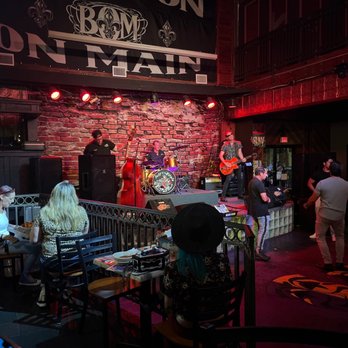 Bourbon on Main - a group of people in a bar - Bars Near Me - New Port Richey, Florida Bourbon on Main - a group of people in a bar - Bars Near Me - New Port Richey, Florida