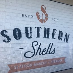 a sign for a seafood market