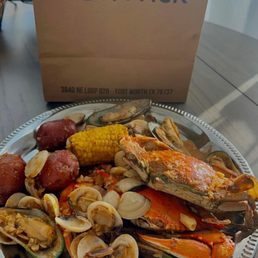 Clams, blue crabs, corn & potatoes. Spicy level 3 crab pack seasoning. Clams, blue crabs, corn & potatoes. Spicy level 3 crab pack seasoning.