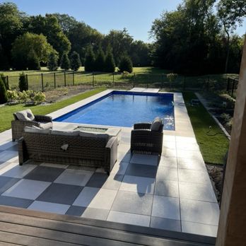 APS Pools and Spas - a view of a backyard pool - Landscaping Near Me - Yorkville, Illinois