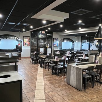 Taco Bell - Dining room with special tile path from front door to bathroom. In case of emergency.... - Fast Food Near Me - Lomita, California Taco Bell - Dining room with special tile path from front door to bathroom. In case of emergency.... - Fast Food Near Me - Lomita, California