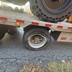 Main Truck & Trailer Repair - Damaged trailer wheel tire