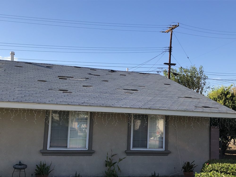 Slide of Lomeli’s Roofing