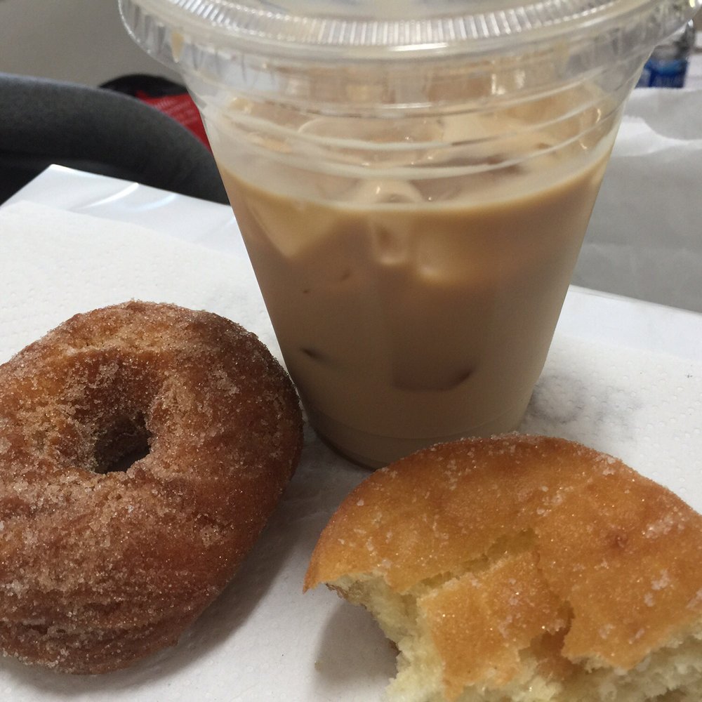 Somebody's Place - Cinnamon sugar doughnut, half eaten malasada (their specialty) doughnut and an iced coffee - Breakfast & Brunch Near Me - Andover, Massachusetts Somebody's Place - Cinnamon sugar doughnut, half eaten malasada (their specialty) doughnut and an iced coffee - Breakfast & Brunch Near Me - Andover, Massachusetts