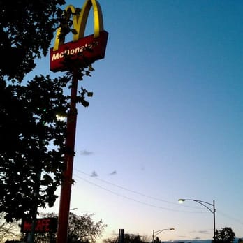 McDonald's - a mcdonald's sign on a pole - Burgers Near Me - Chicago, Illinois