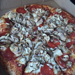 Vitos Pizza - 3topping medium pizza with pepperoni ground beef and mushrooms. Yummy!