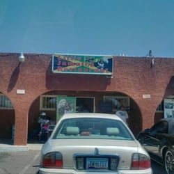 Little Jamaica - Conveniently located next to a smoking accessories shop and a tax accountant.
