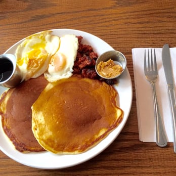 Colina Cuervo - Buttermilk Pancakes - my eggs were over medium, crispy chorizo, dulce de leche, maple syrup - Cafes Near Me - Brooklyn, New York Colina Cuervo - Buttermilk Pancakes - my eggs were over medium, crispy chorizo, dulce de leche, maple syrup - Cafes Near Me - Brooklyn, New York
