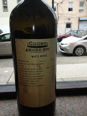 Photo of Cucino a Modo Mio - Corona, NY, US. Wine list , listed on huge bottles
