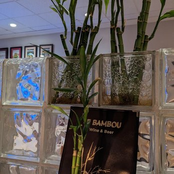 Le Bambou - bamboo plants in vases on a table - Vietnamese Near Me - Del Mar, California Le Bambou - bamboo plants in vases on a table - Vietnamese Near Me - Del Mar, California