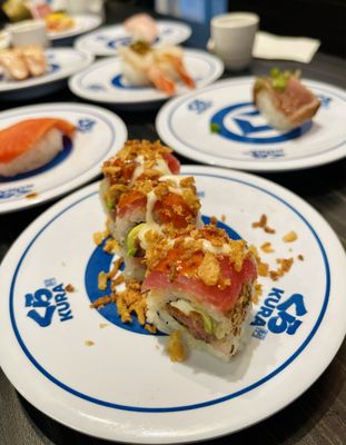 Kura Revolving Sushi Bar by null