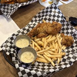 Steak fingers pretty much chicken fried steak cut into three pieces with a superlative cream, gravy and crispy french fries