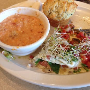 Wild Eggs - Surfer Girl omelet w/ egg whites, Everything muffin & grits of the day: cheddar, bacon, tomato. - Breakfast & Brunch Near Me - Lexington, Kentucky