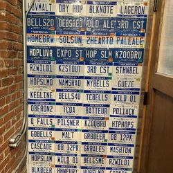Bell's Brewery - Wall of license plates on the way to the bathroom