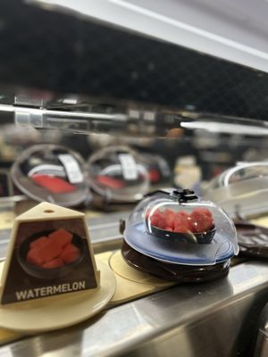 Kura Revolving Sushi Bar by null