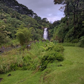 The Inn At Kulaniapia Falls - View of the waterfall from along the bamboo garden path. - Bed & Breakfast Near Me - Hilo, Hawaii The Inn At Kulaniapia Falls - View of the waterfall from along the bamboo garden path. - Bed & Breakfast Near Me - Hilo, Hawaii