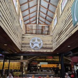 Rudy's "Country Store" and Bar-B-Q - The reason the restaurant feels open and well lit. Manny didn't look up with a plate of goodness ahead of them