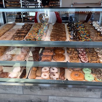 Randy's Donuts - Which to pick.... red velvet was calling my name!!!! - Donuts Near Me - Downey, California Randy's Donuts - Which to pick.... red velvet was calling my name!!!! - Donuts Near Me - Downey, California