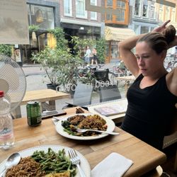 Bayuhome - My friend and our meals and the owner brought us a fan as it was an exceptionally hot summer day