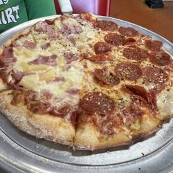Mount Dora Pizza & Subs - Half pep, half ham and pineapple.