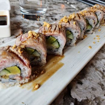 Yu or Mi Sushi - Thai sunset topped with tender beef and there is a basil kick inside! - Sushi Bars Near Me - Las Vegas, Nevada