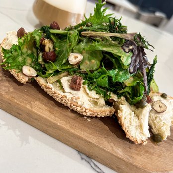 Azalea - a piece of bread with greens and nuts - Tapas Bars Near Me - Montreal, Quebec Azalea - a piece of bread with greens and nuts - Tapas Bars Near Me - Montreal, Quebec