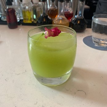 Anjou - Flightless Bird: rum, melon liquor, kiwi, lime, basil & bitters - Cocktail Bars Near Me - Cincinnati, Ohio Anjou - Flightless Bird: rum, melon liquor, kiwi, lime, basil & bitters - Cocktail Bars Near Me - Cincinnati, Ohio