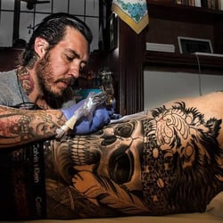 Lost Cowboy Tattoo and Gallery - GUIDO BALDINI AT WORK ON A CUSTOM BACK PIECE