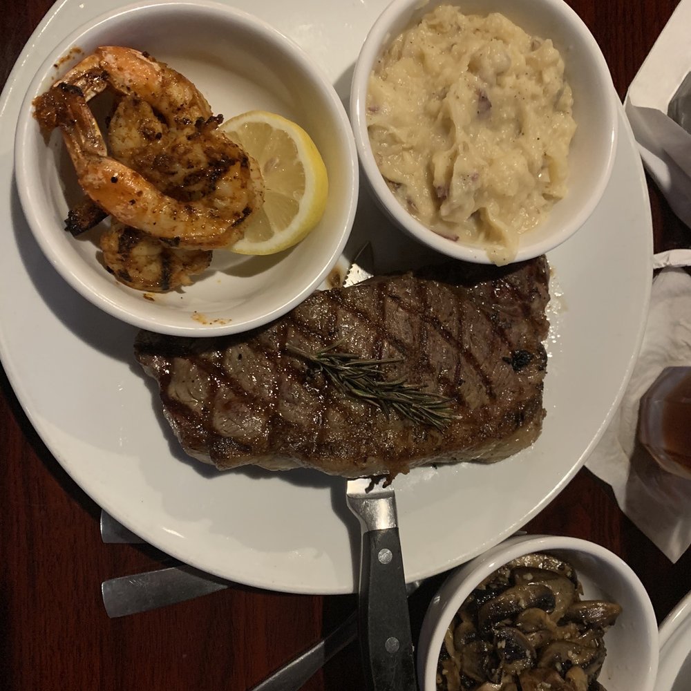 AC's Steakhouse Pub - Hernando - NY strip, grilled shrimp, garlic potatoes & sautéed mushrooms. - American Near Me - Hernando, Mississippi