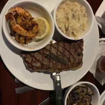 AC's Steakhouse Pub - Hernando - NY strip, grilled shrimp, garlic potatoes & sautéed mushrooms. - American Near Me - Hernando, Mississippi