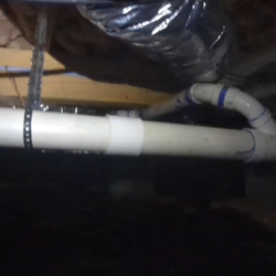 PlumbSmart Plumbing and Drains - The fix from plumber #2 after we called back. Adjusted slope in the large pipe, to create more drop in the 2" problem pipe. Not bad.