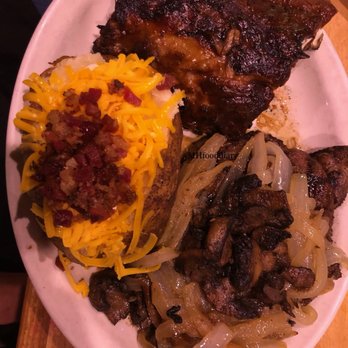 Texas Roadhouse - 10 oz Ribeye with ribs and loaded potato - Steakhouses Near Me - Harvey, Louisiana Texas Roadhouse - 10 oz Ribeye with ribs and loaded potato - Steakhouses Near Me - Harvey, Louisiana
