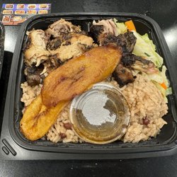 Kings & Queens - Jerk chicken (with side of sauce) with veggies, rice and plantains.