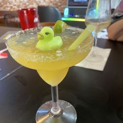 Roy's Pub - Cadillac with a duck