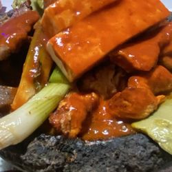 La Parrilla - Molcajetero azteca. The only good thing in it was the cheese. How the heck does a cook manage to serve a dried up nopal??