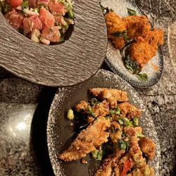 Mala crispy wing in the back, tuna tartare & mua kua prik gleur