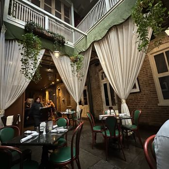 Muriel's Jackson Square - Ambiance of our dining room near the bar - Cajun/Creole Near Me - New Orleans, Louisiana Muriel's Jackson Square - Ambiance of our dining room near the bar - Cajun/Creole Near Me - New Orleans, Louisiana
