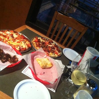 Toppers Pizza Place - Pizz, peppers, wine and garlic bread - Pizza Near Me - Oxnard, California Toppers Pizza Place - Pizz, peppers, wine and garlic bread - Pizza Near Me - Oxnard, California