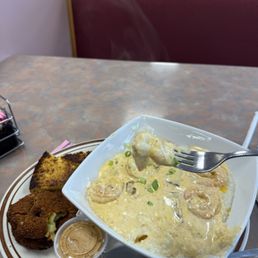 The is their shrimp and grits with fried green tomatoes and the best sweet cornbread you will ever have  Big enough for 2 people.