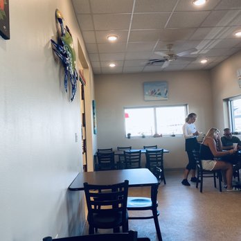 Water's Edge Cafe - customers sitting at tables - Breakfast & Brunch Near Me - Port Canaveral, Florida Water's Edge Cafe - customers sitting at tables - Breakfast & Brunch Near Me - Port Canaveral, Florida